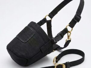 Black adjustable horse feeding muzzle with nylon straps, secure buckle, and reinforced stitching
